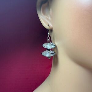 Sterling Silver wires and acrylic saucer shapes dangle earrings. 2” long